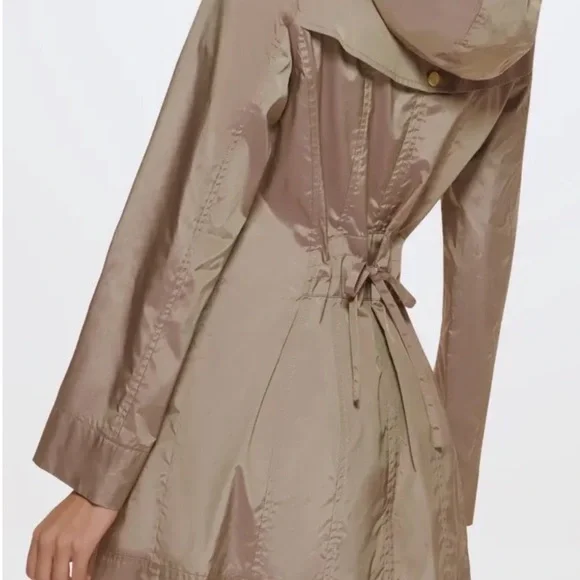 Cole Haan Chic Rain Coat with back bow & hideaway hood. Iridescent beige in XS. - Picture 13 of 13